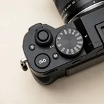 Camera top plate with ISO button and mode dial — where you set ISO