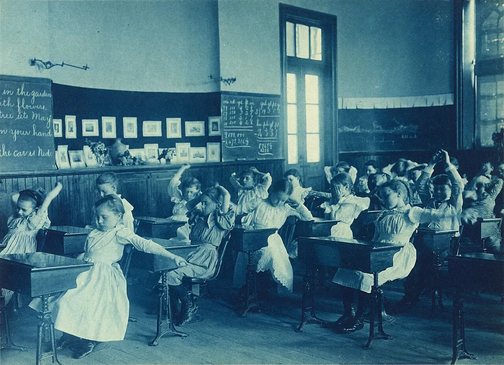 Vintage cyanotype schoolgirls photograph, c. 1899 — blue monochrome from the cyanotype process